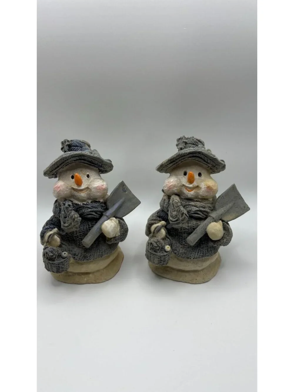Pair Of Snowman Figurines With Hats & Scarves Holding Shovels Winter Decor